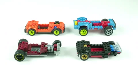 Slow Motion Assembling Lego Kids Toy Cars. Stock Footage 221780893