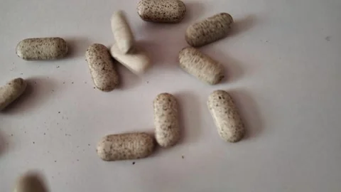 Slow Motion Assorted Pills Falling on White Background – Close-Up Healthcare Stock Footage 339131369