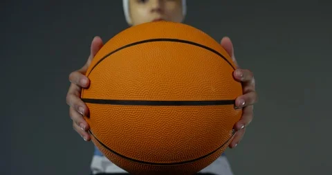 Slow Motion Of Athletic Pretty Mixed Race Female Holding Basketball To Camera  Stock Footage 112777240