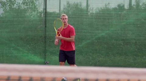 Slow Motion Of Athletic Tennis Player Striking Forehand And Backhand Stock-Footage 34478332