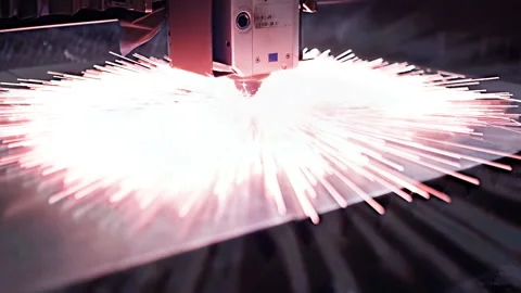 Slow motion: automatic cnc laser cutting machine working with sheet metal Stock Footage 153578336