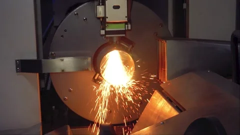 Slow motion: automatic cnc laser cutting machine working with metal square pipe Video stock 258156334