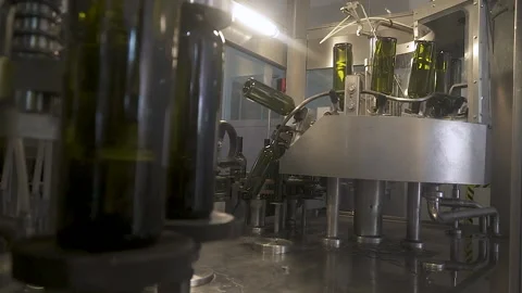 Slow-motion Automatic conveyor with moving bottles on the belt, Stock-Footage 155425879