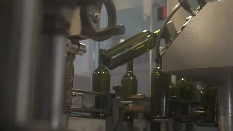 Slow-motion Automatic conveyor with moving bottles on the belt, Stock Footage 155441781