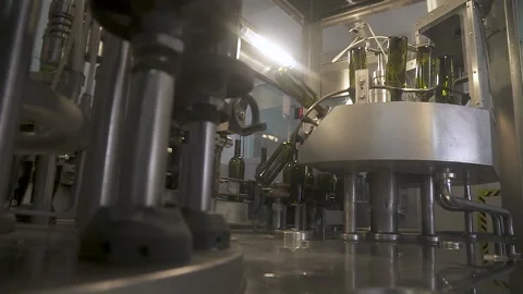 Slow-motion Automatic conveyor with moving bottles on the belt, Stock-Footage 155441855