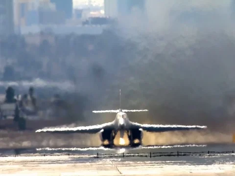 Slow motion B1 Bomber taking off through heat haze Stock Footage 106987183