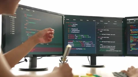 Slow motion back end software developer engineer writing code. Burgeoning Stock Footage 263221064