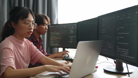 Slow motion back end software developer engineer writing code. Burgeoning Stock Footage 264177022