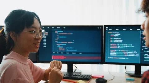 Slow motion back end software developer engineer writing code. Burgeoning Stock Footage 265497697