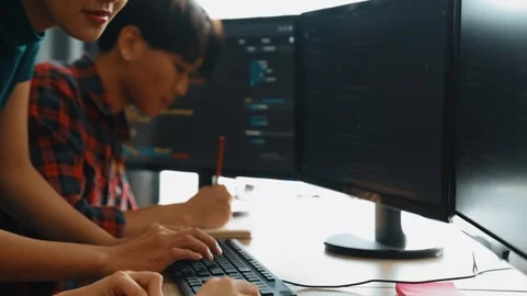 Slow motion back end software developer engineer writing code. Burgeoning Stock Footage 265498566