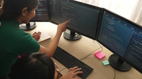 Slow motion back end software developer engineer writing code. Burgeoning Stock Footage 267172736