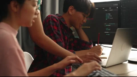 Slow motion back end software developer engineer writing code. Burgeoning Stock Footage 269125211