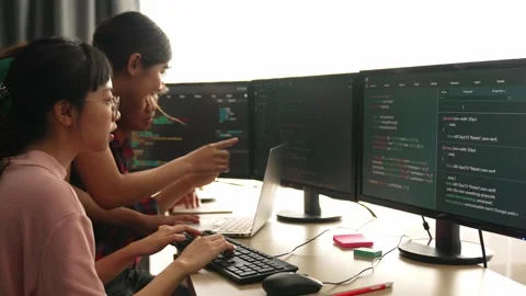 Slow motion back end software developer engineer writing code. Burgeoning Stock Footage 270040206