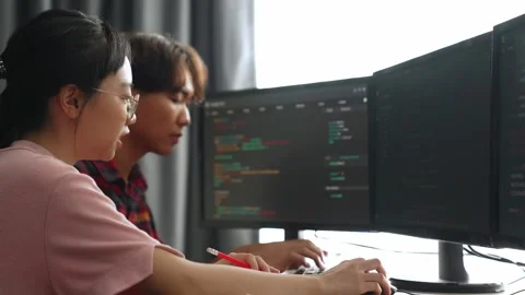 Slow motion back end software developer engineer writing code. Burgeoning Stock Footage 270458739