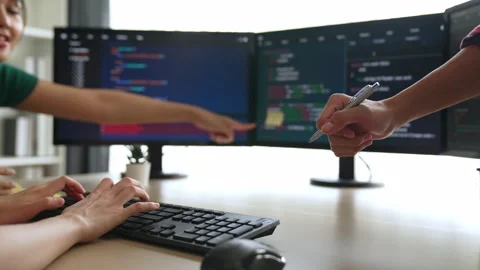 Slow motion back end software developer engineer writing code. Burgeoning Stock Footage 270703677