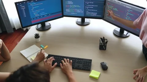 Slow motion back end software developer engineer writing code. Burgeoning Stock Footage 271613485