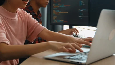 Slow motion back end software developer engineer writing code. Burgeoning Stock Footage 272253063