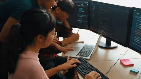 Slow motion back end software developer engineer writing code. Burgeoning Stock Footage 273130246