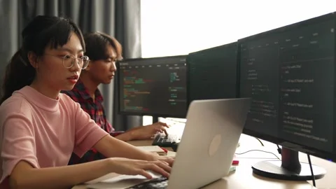 Slow motion back end software developer engineer writing code. Burgeoning Stock Footage 273965958