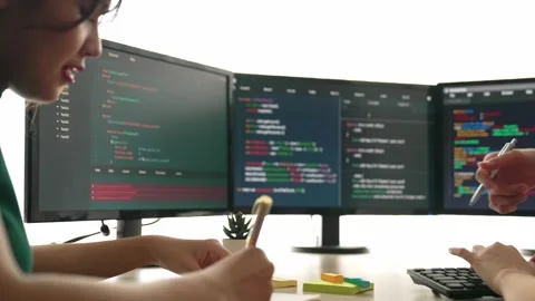 Slow motion back end software developer engineer writing code. Burgeoning Stock Footage 274632745