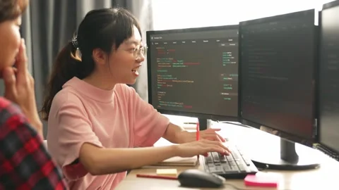 Slow motion back end software developer engineer writing code. Burgeoning Stock Footage 274672299