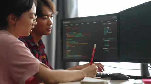 Slow motion back end software developer engineer writing code. Burgeoning Stock Footage 275803812