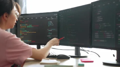 Slow motion back end software developer engineer writing code. Burgeoning Stock Footage 276195529