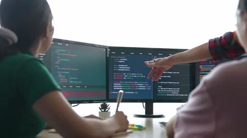 Slow motion back end software developer engineer writing code. Burgeoning Stock Footage 276195732
