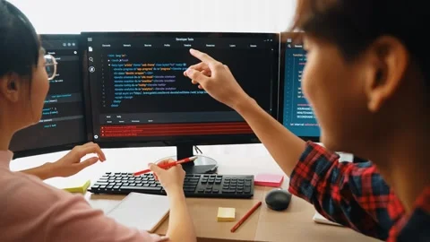 Slow motion back end software developer engineer writing code. Burgeoning Stock Footage 277356307