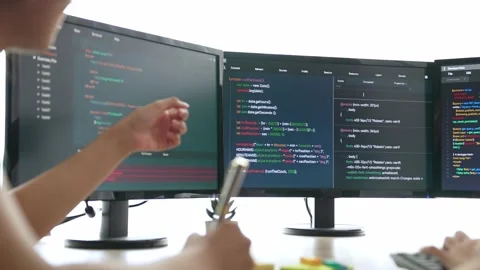 Slow motion back end software developer engineer writing code. Burgeoning Stock Footage 278063462