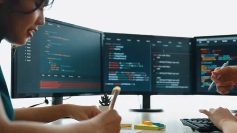 Slow motion back end software developer engineer writing code. Burgeoning Stock Footage 280511696
