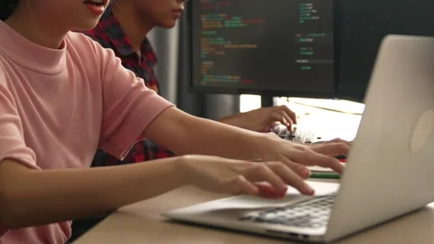 Slow motion back end software developer engineer writing code. Burgeoning Stock Footage 283047712