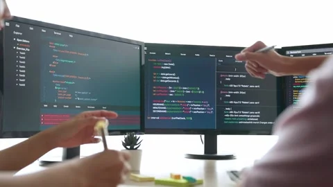 Slow motion back end software developer engineer writing code. Burgeoning Stock Footage 283403999