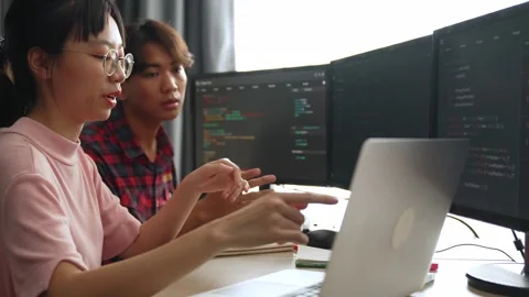 Slow motion back end software developer engineer writing code. Burgeoning Stock Footage 283592932