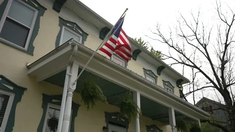 Slow motion backlit scene of Union Betsy Ross Civil War flag flowing in the wind Stock Footage 154205561