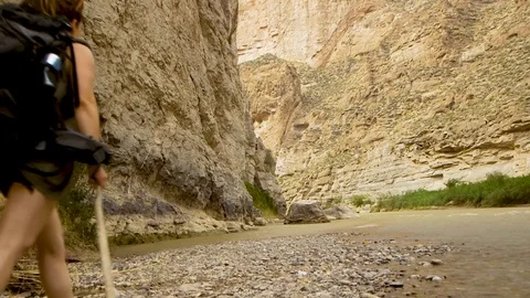 Slow Motion Backpacker hiking alone in Canyon at Big Bend National Park Stock Footage 78400424
