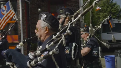 Slow Motion Bagpipe Players in Parade Stock Footage 230293841