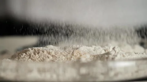 Slow Motion bakery chef sifting flour. Baking concept. Stock Footage 143482679