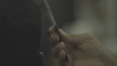 Slow motion barber using pick on hair soft focus s-log prores422 Stock Footage 236415843