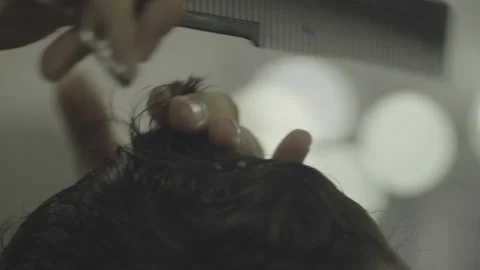 Slow motion barber using scissors to cut hair raw s-log color prores 422 Stock Footage 236415517