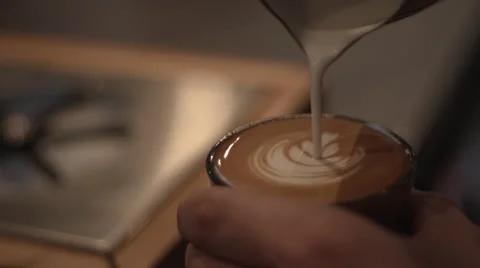 Slow Motion Barista making Latte Art Stock Footage 47790710