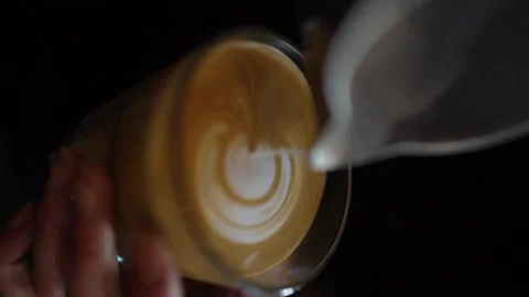 Slow Motion Barista Making Latte Art Video stock 196176388