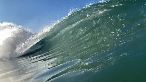 Slow motion of a barrelling wave breaking. Stock Footage