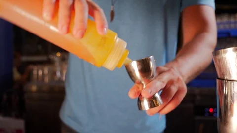 Slow motion of a bartender making alcohol in a bar Stock Footage 93313578