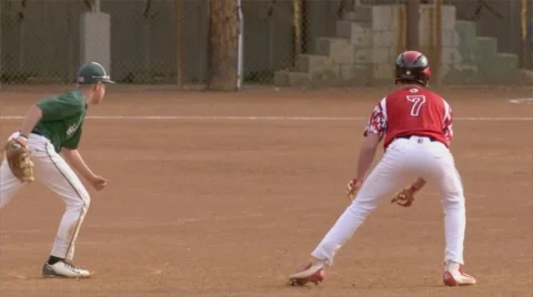 Slow-motion Baseball Leading Off First Stock Footage 62624363