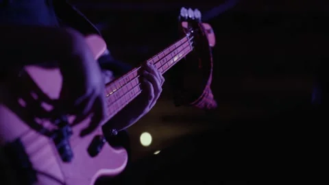 Slow motion bass player performing at live concert / music festival Stock Footage 210249254