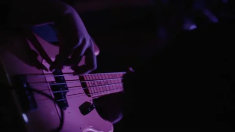 Slow motion bass player performing at live concert / music festival Stock Footage 210249260