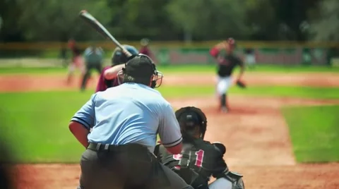 Slow motion of batter hitting home run during a baseball game Stock Footage 56215516