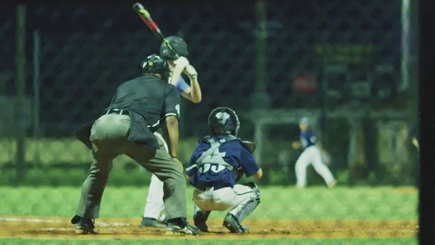 Slow Motion of batter at home plate waiting for ball during baseball game Stock Footage 82317489