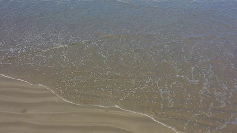 Slow motion beach and surf Stock Footage 124999738
